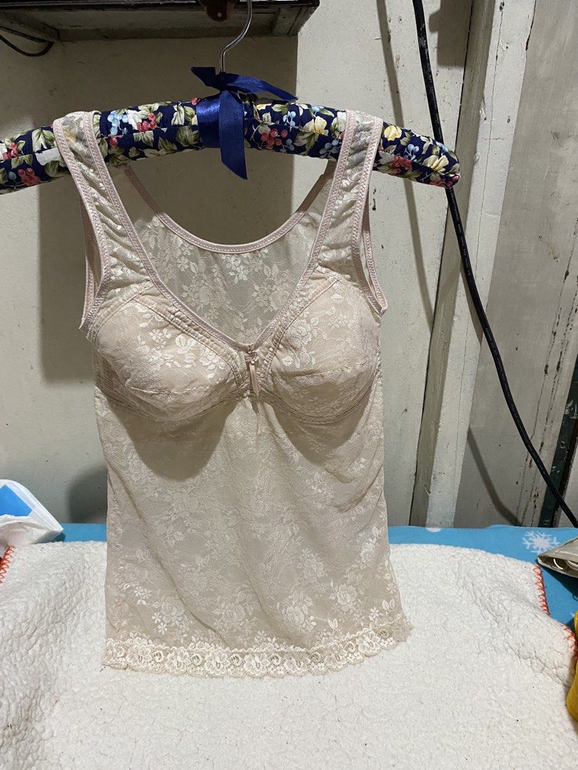 Lace Camisole with Built-in Bra (Category: Undergarments & Loungewear) located in Manila. Submitted by resi.diaz (Listing ID 1462431193, Image 1). Description: - Undersized XL on tag. Fits medium, cup B. - Cream colored camisole - Delicate lace overlay - Built-in bra with light padding - Adjustable straps - Hem with lace trim - Comfortable and supportive for daily wear - Perfect for layering.