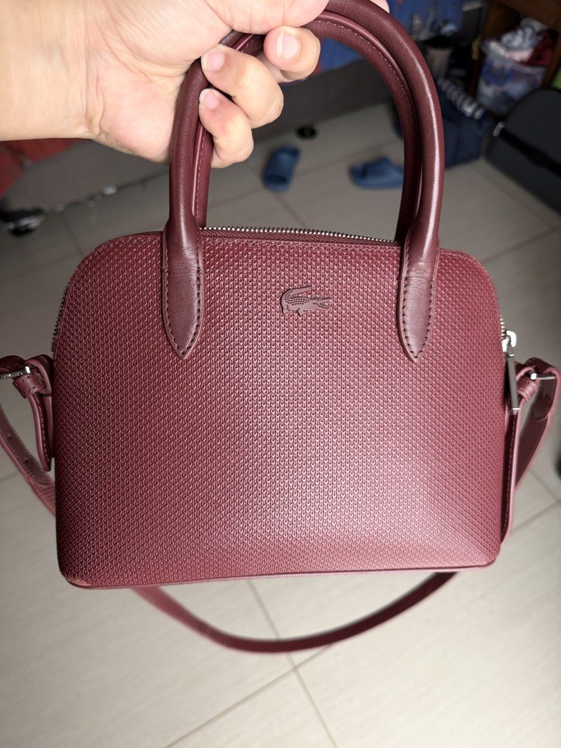 Lacoste bag (Category: Luxury Bags & Wallets) located in Paranaque City. Submitted by iamminel (Listing ID 1313352568, Image 2). Description: for sale: Original Lacoste bag condition 7/10 mop: gcash/bdo well used but in good condition negotiable ver nice.