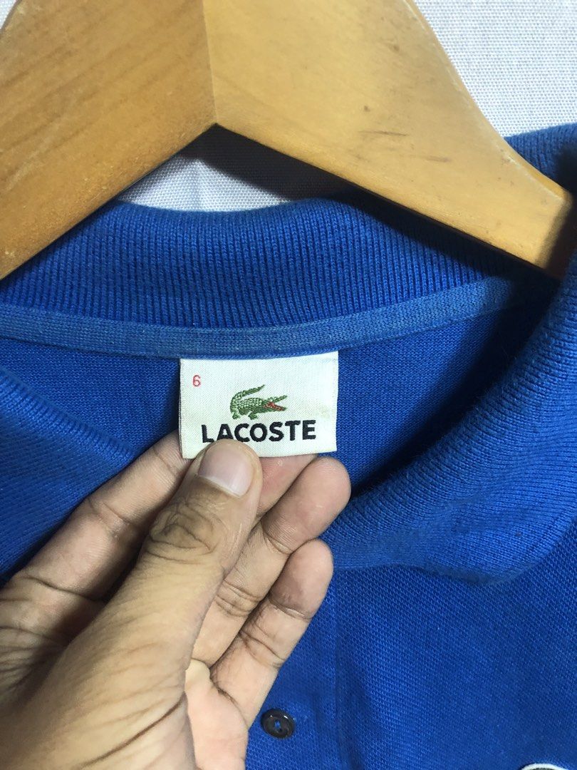 Lacoste blue polo shirt (Category: Tshirts & Polo Shirts ) located in Cagayan de Oro. Submitted by kennymiiiiii (Listing ID 1462294245, Image 3). Description: 24*28 no issue Need wash C44.