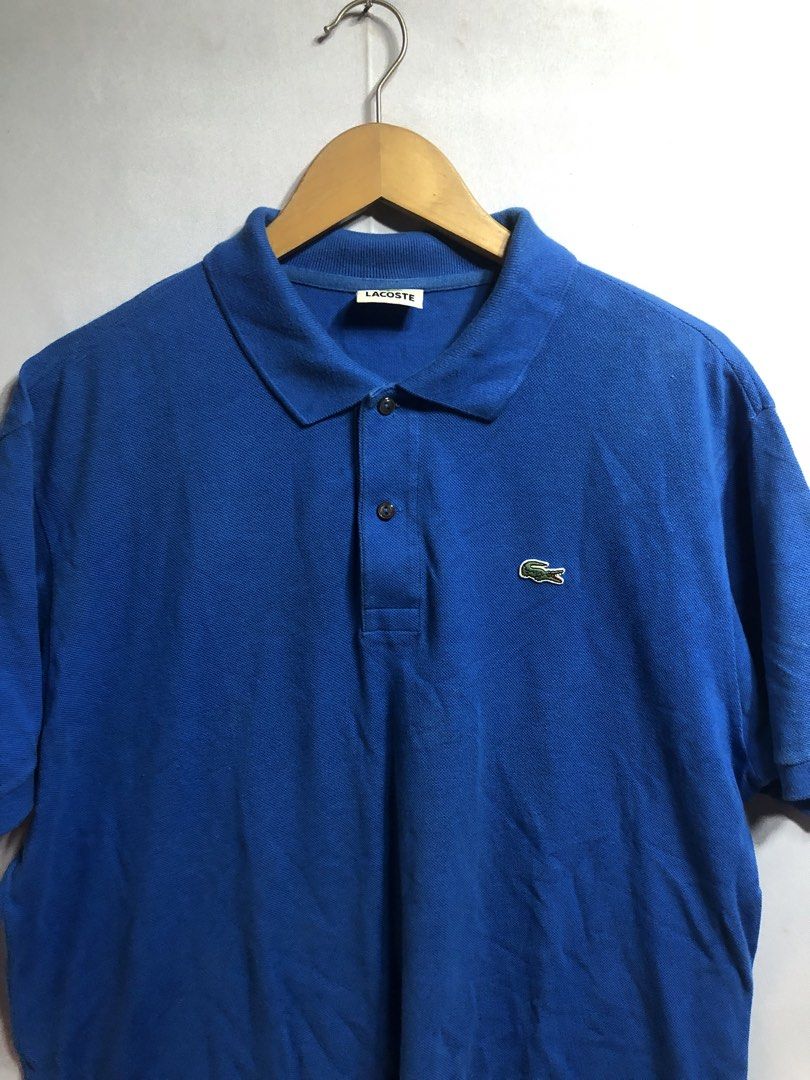 Lacoste blue polo shirt (Category: Tshirts & Polo Shirts ) located in Cagayan de Oro. Submitted by kennymiiiiii (Listing ID 1462294245, Image 2). Description: 24*28 no issue Need wash C44.