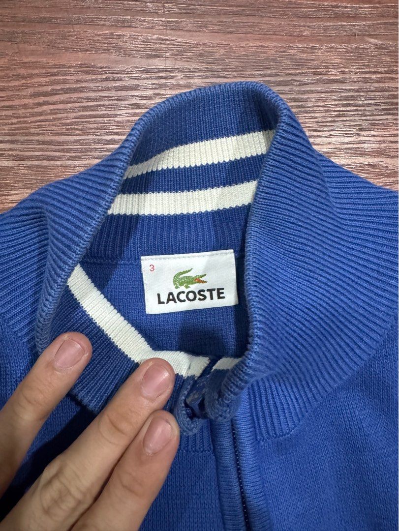 Lacoste Blue Zip-Up Jacket with White Stripes (Category: Coats, Jackets and Outerwear) located in Manila. Submitted by douglassss24 (Listing ID 1462368408, Image 2). Description: Dimes 21-22w 26-27l.