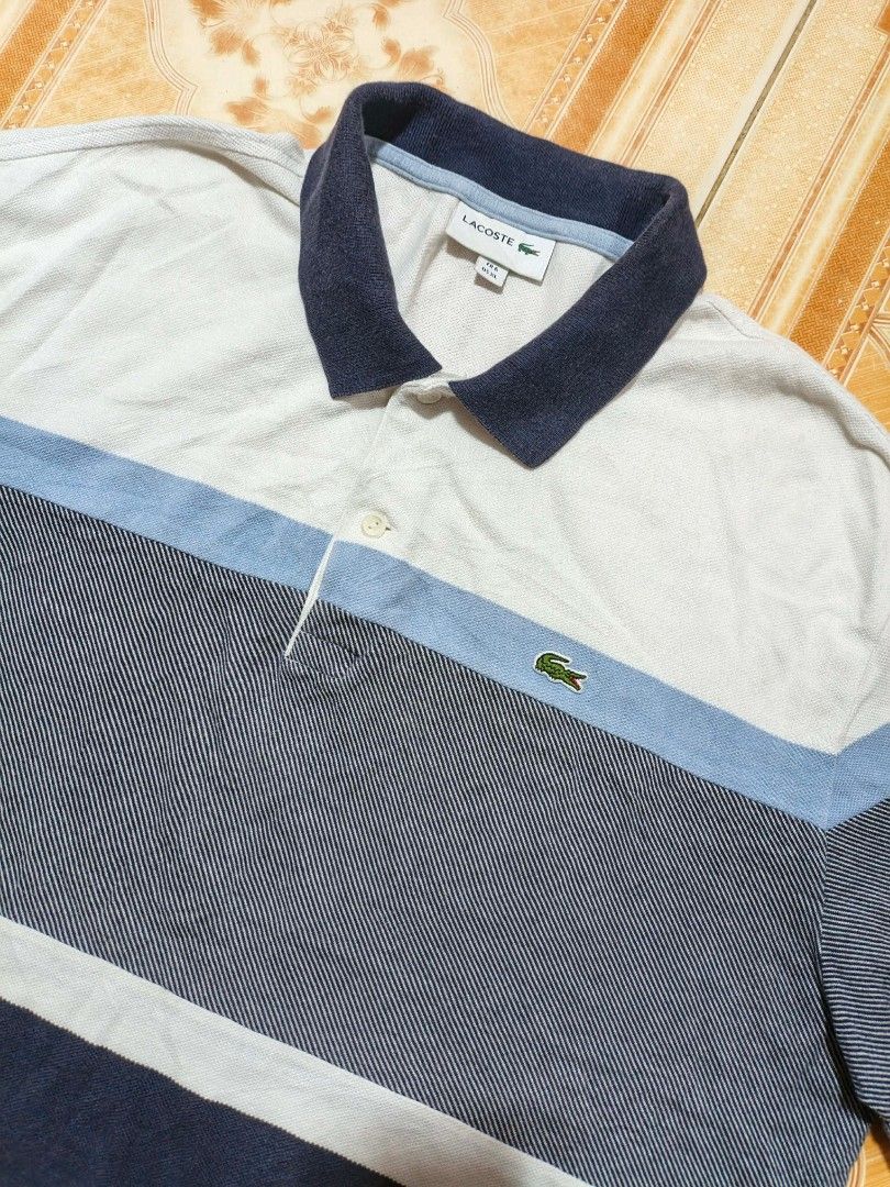 Lacoste polo shirt (Category: Tshirts & Polo Shirts ) located in Alburquerque. Submitted by ayrelieonlineshop (Listing ID 1462410639, Image 3). Description: Lacoste polo shirt pang Tito na polo size FR 6 US XL dimensions W-23.5 L-28 no pinhole or punit.