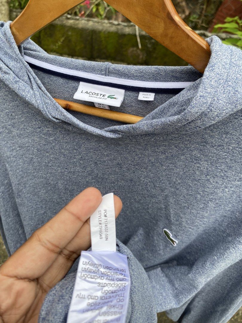 Lacoste Regular Fit Grey Hoodie (Category: Hoodies) located in Santo Tomas. Submitted by jomeldaniel999 (Listing ID 1462391650, Image 2). Description: - Authentic Lacoste Grey Hoodie - Regular Fit - Long Sleeves with Hood - Kangaroo Pocket - Small Crocodile Logo on Chest - Made in Peru - Please check photos for condition details.
