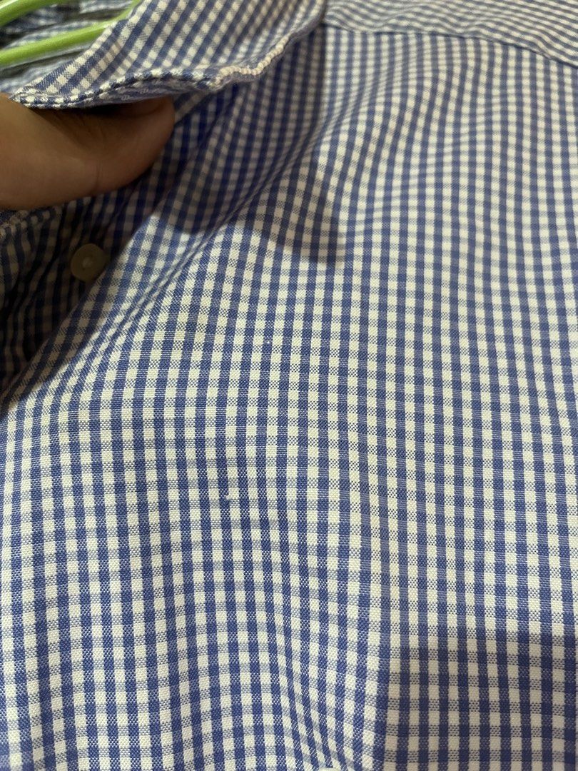 Lacoste Regular Fit Long Sleeve Shirt (Category: Tshirts & Polo Shirts ) located in Manila. Submitted by acloset.mnl (Listing ID 1462403041, Image 3). Description: - Classic blue and white gingham pattern - Lacoste long-sleeve shirt - Regular fit - Iconic embroidered crocodile logo on chest - Button-up front - Versatile for casual and smart-casual outfits - Size: FR 44 / US XL - Worn once for an event, may 2 small pin holes barely noticeable (che