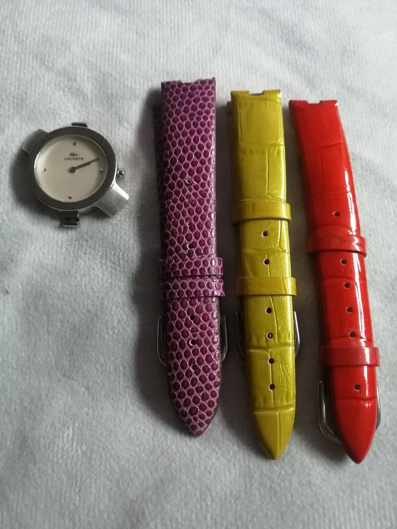 Lacoste Watch with Interchangeable Straps (Category: Women's Watches) located in Quezon City. Submitted by globaltravelboutique (Listing ID 1462313079, Image 2). Description: - Authentic Lacoste Watch - Silver watch face with white dial - Stainless steel back - Water-resistant up to 3 ATM - Comes with 3 interchangeable straps: purple, yellow, and red - Straps are made of durable leather-look material - Easily switch straps to match your outfit or