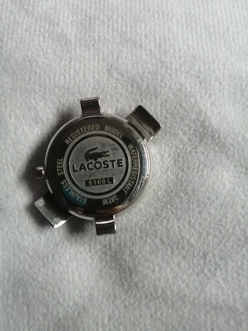 Lacoste Watch with Interchangeable Straps (Category: Women's Watches) located in Quezon City. Submitted by globaltravelboutique (Listing ID 1462313079, Image 3). Description: - Authentic Lacoste Watch - Silver watch face with white dial - Stainless steel back - Water-resistant up to 3 ATM - Comes with 3 interchangeable straps: purple, yellow, and red - Straps are made of durable leather-look material - Easily switch straps to match your outfit or