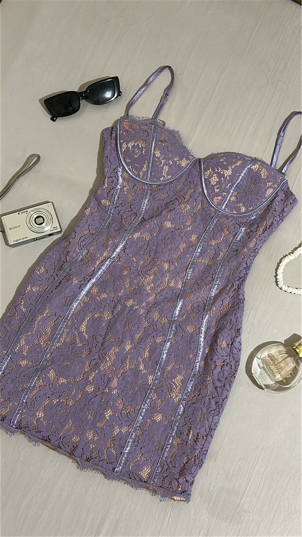 Lala Lavender Lace Mini Dress (Category: Dresses) located in Imus. Submitted by donnasaurr19 (Listing ID 1462368844, Image 2). Description: A lavender lace bodycon mini dress with spaghetti straps and a corseted, boned bustier bodice Used ONLY ONCE Can fit to SMALL to SEMI-MEDIUM Frame.