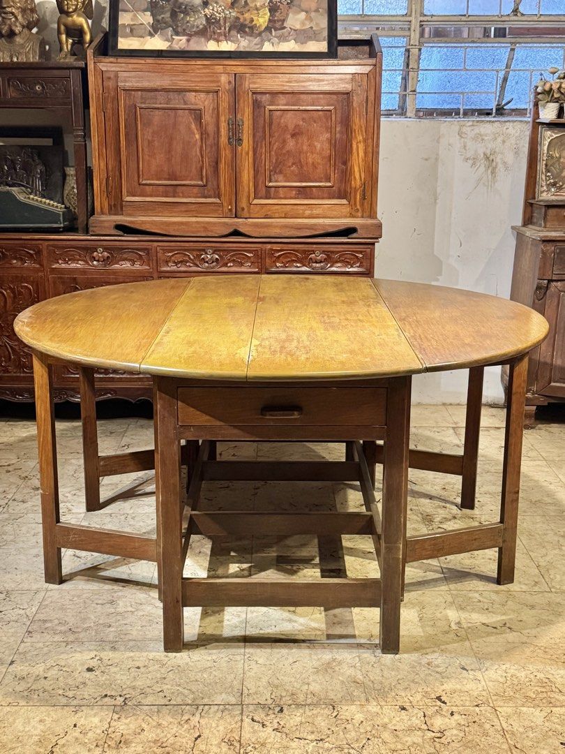 Large Solid Narra 8 Seater Drop Leaf Folding Round Table (Category: Tables & Sets) located in Manila. Submitted by sinaunang_gamit (Listing ID 1462367544, Image 2). Description: Large Solid Narra 8 Seater Drop Leaf Folding Round Table Height: 31 inches Diameter: 64 inches Vintage Solid Narra Sturdy and ready to use Hinges are of and functional ₱15k.
