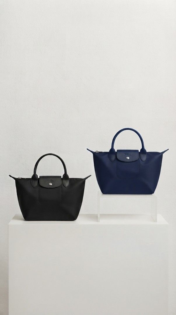 LC Nylon Top Handle Bag (Category: Luxury Bags & Wallets) located in Davao. Submitted by nisa_chan04 (Listing ID 1462398635, Image 1). Description: - Available colors: Black, Navy Blue - Material: Durable nylon with leather trim - Features: Zip closure, top handles - Ideal for: Everyday use, travel - Design: Compact yet spacious - Comes with a crossbody strap SOLD per PIECE not bundle.