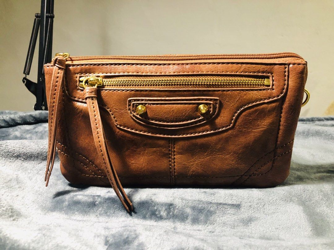LEATHER SLING BAG (Category: Cross-body Bags) located in Imus. Submitted by sixtydegree (Listing ID 1462376671, Image 2). Description: 📐 MEASUREMENTS‼️ H - 5.5 inches L - 9.5 inches 💸: GCash 📤: J&T Only! 🛵: LALAMOVE for same day delivery. 📌: Bought from Japan 📌: Shipping Fee is not included. 📌: Please manage your expectations as your dealing with Pre-Loved items. 📌: All items are Pre-Loved unless stated as Brand New! 📌: Flaws are stated 