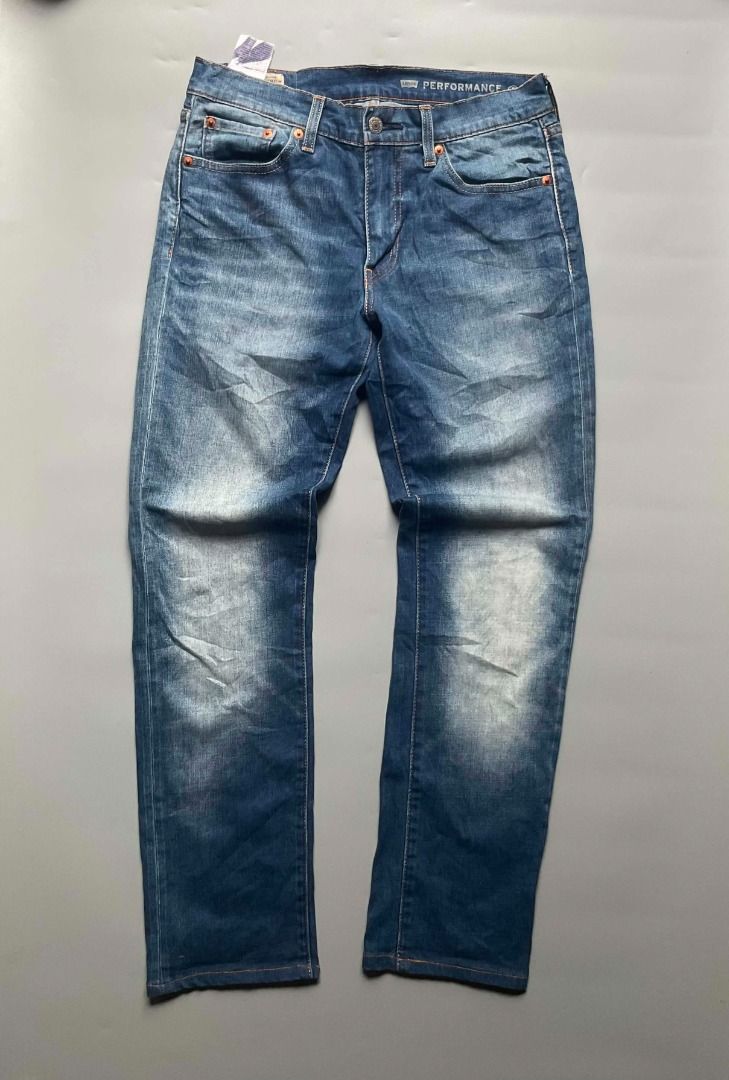 Levi's 511 Performance Jeans (Category: Jeans) located in Talisay. Submitted by justindanielle17 (Listing ID 1462325482, Image 2). Description: -Authentic/Original -Waist: 30 -Length: 38 inches -Leg opening: 7 inches -Excellent Condition -9.7/10 color rate - Brand: Levi's - Model: 511 - Wash: Dark wash with subtle fading - Material: Performance denim for comfort and flexibility - Closure: Button and zip fly - Pockets: Classic five-pocket styling 