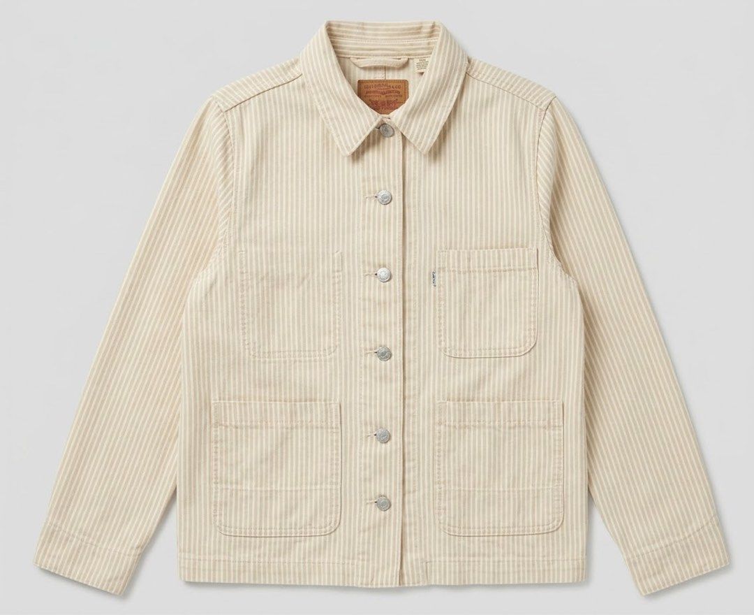 Levi's Premium Striped Worker Jacket Size S (Category: Coats, Jackets and Outerwear) located in Borongan. Submitted by thriftsbyblas (Listing ID 1462372226, Image 1). Description: - Classic Levi's worker jacket - Beige and white stripe pattern - Four front pockets - Button closure - Made with Levi's Water<Less> technology - Quality Clothing label inside - Ideal for everyday wear.