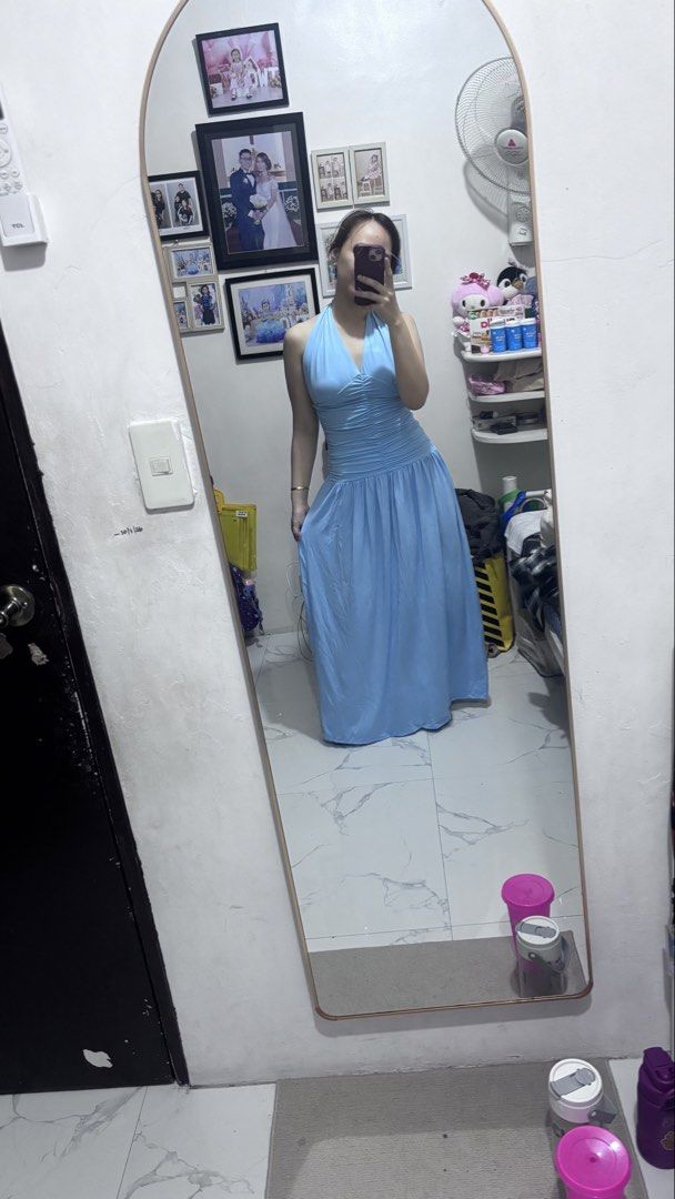 Light Blue Halter Neck Maxi Dress (Category: Dresses) located in Manila. Submitted by bravehorse.17563a (Listing ID 1462397530, Image 1). Description: - Light blue maxi dress - Halter neckline - Ruching detail around the waist - Flowing skirt - Ideal for formal events or parties - Comfortable and stylish fit.