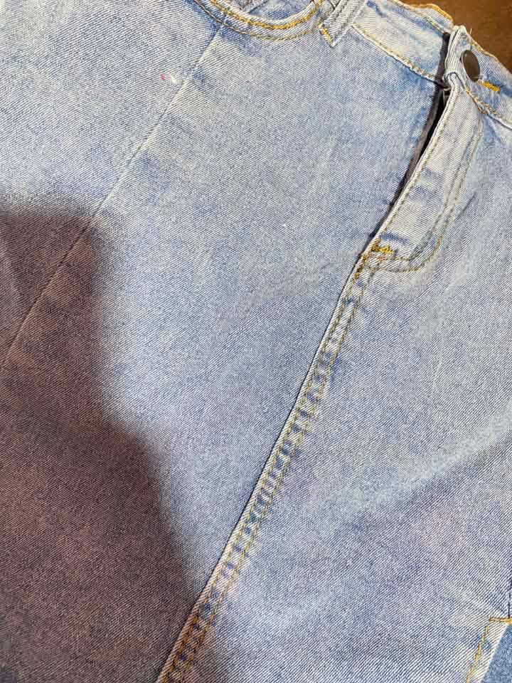 Light Wash Denim Mini Skirt with Front Slit (Category: Skirts) located in Paranaque City. Submitted by golden_jinkay (Listing ID 1462423519, Image 3). Description: -Waist 26-28 -16 - Cute light wash denim mini skirt - Features a stylish front slit - Soft and comfortable denim fabric - Ideal for casual outings - Easy to pair with any top - A versatile wardrobe essential.
