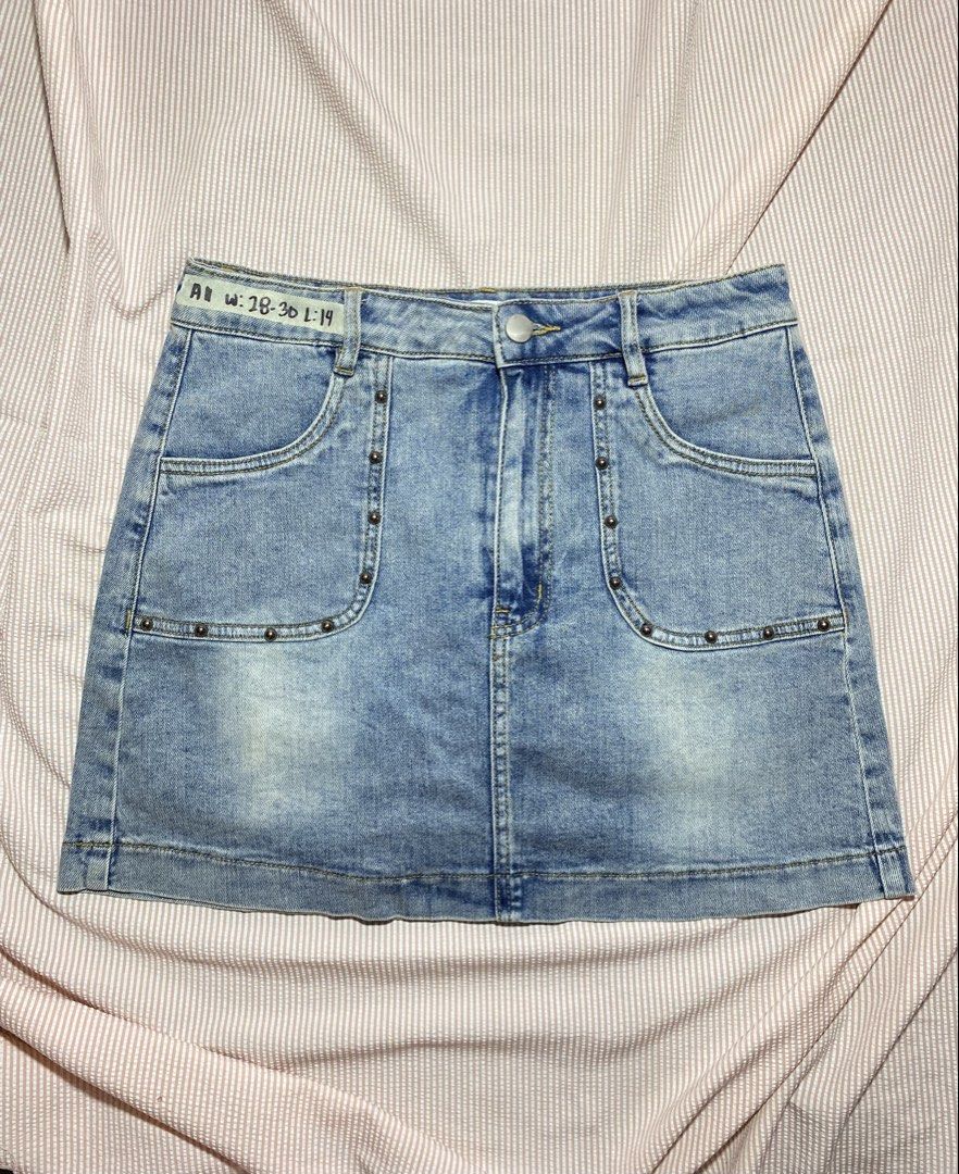 Light Wash Denim Mini Skirt with Stud Details (Category: Skirts) located in Paranaque City. Submitted by golden_jinkay (Listing ID 1462424073, Image 1). Description: -Waist:28-30 -Lenght:14 - Cute light wash denim mini skirt - Features stud details on pockets and waistband - Classic five-pocket design - Size: W:28-30, L:19 - Great for casual wear and easy to style.