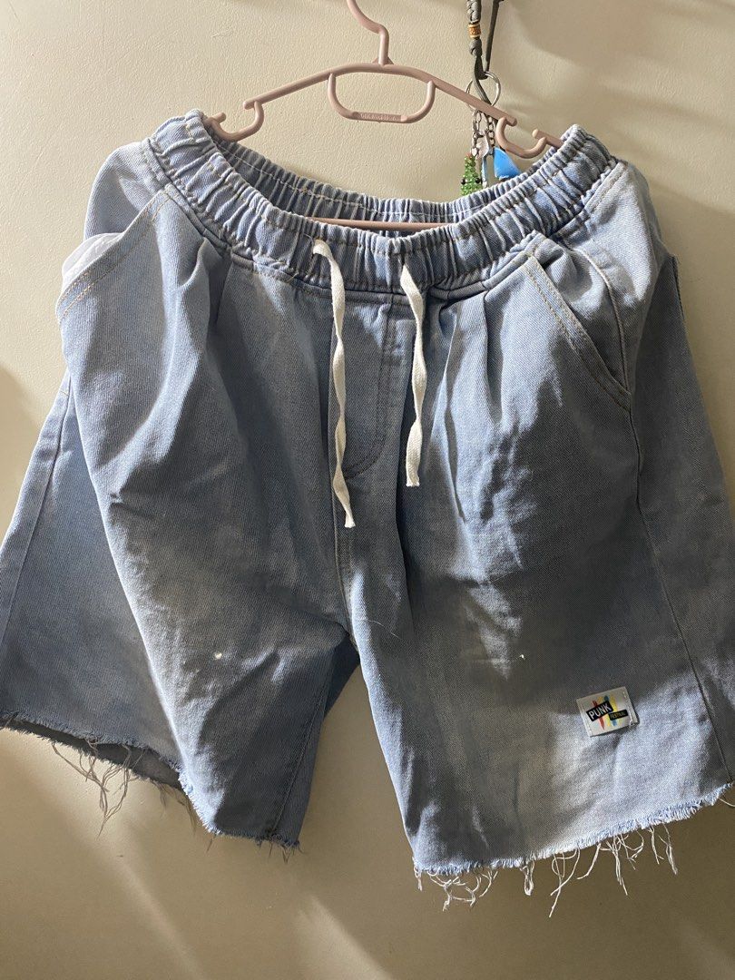 Light Wash Denim Shorts with Drawstring Waist (Category: Shorts) located in Manila. Submitted by jiro0628 (Listing ID 1462431207, Image 1). Description: - Casual light wash denim shorts - Elastic waistband with white drawstring - Frayed hem for a relaxed vibe - 'PUNK' logo patch on right leg - Ideal for everyday outfits.