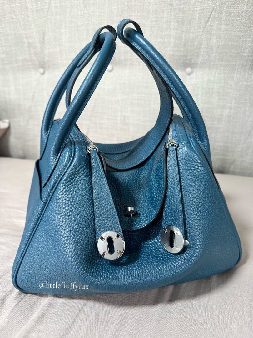 Lindy 26 in Blue de Malte (Category: Luxury Bags & Wallets) located in Pasig City. Submitted by littlefluffylux (Listing ID 1462273366, Image 1). Description: - Herme Lindy 26 - Color: Blue de Malte - Hardware : Phw - Riri Zipper Condition: Pre-loved/please seephotos for actual condition. ‼️Not Guaranteed Auth RFS: Need to lessen a few of my Lindy collections. 💕 📸Actual item and photos posted. For serious buyers only. Please check all photos ca