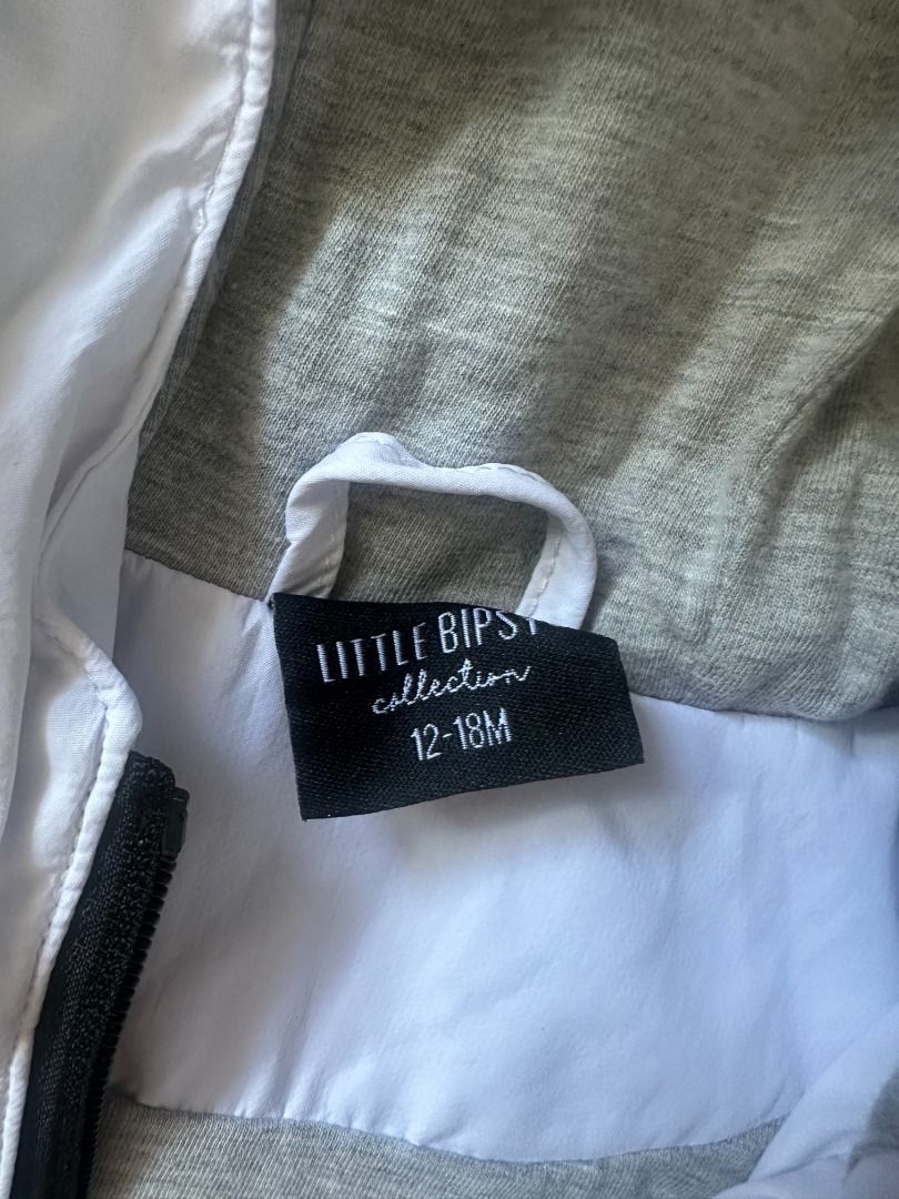 Little Bipsy White Windbreaker, Size: 12-18M (Category: Babies & Kids Fashion) located in Makati City. Submitted by travelfinds34611 (Listing ID 1462272113, Image 2). Description: Little Bipsy White Windbreaker, Size: 12-18M Size: 12-18 months - Two front zip pockets - Easy to zip up - Ideal for layering and cooler days BRAND NEW. NEVER USED..