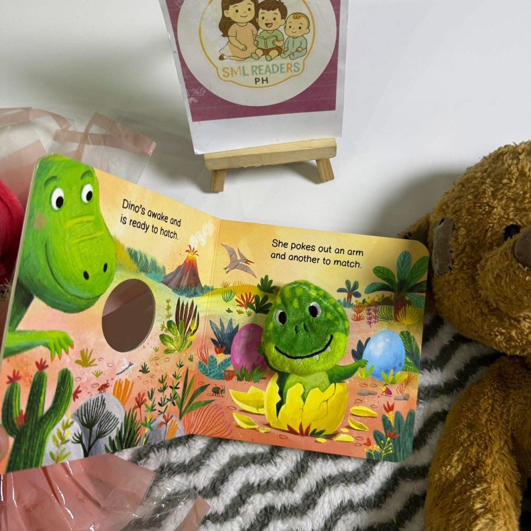 Little Dino Finger Puppet (Category: Children's Books) located in Taguig. Submitted by smlreadersph (Listing ID 1462361856, Image 2). Description: 💗 𝐋𝐢𝐭𝐭𝐥𝐞 𝐃𝐢𝐧𝐨 𝐅𝐢𝐧𝐠𝐞𝐫 𝐏𝐮𝐩𝐩𝐞𝐭🦕💚 Finger Puppet Book • My Baby & Me 📖 Condition: Very cute preloved condition! Still very nice and ready for lots of fun finger-puppet play with your little one. 🥰 👶👧 Age Recommended: 0–3 years 📘 About the Book: Say hello to Little Dino! 🦕 A sw