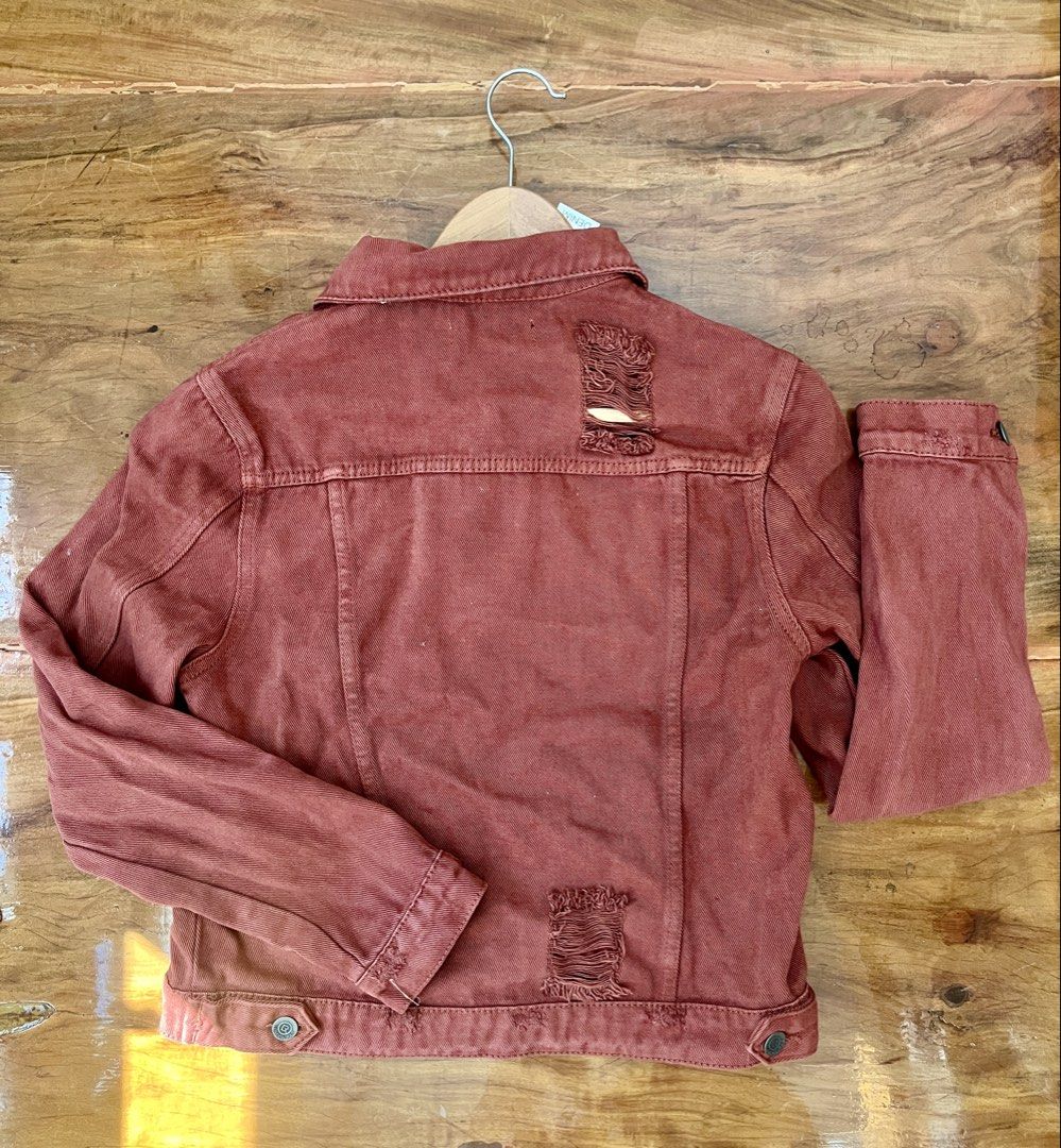LONDON RAG Distressed Orange/Rust Denim Jacket Size M (Category: Coats, Jackets and Outerwear) located in Rosario. Submitted by chasiebananie (Listing ID 1462294421, Image 2). Description: Distressed denim jacket from London Rag Orange/Rust color Size Medium Distressed look with rips on the front and back. Button closure Functional pockets Great for layering Personally owned, never used. Tag still intact.