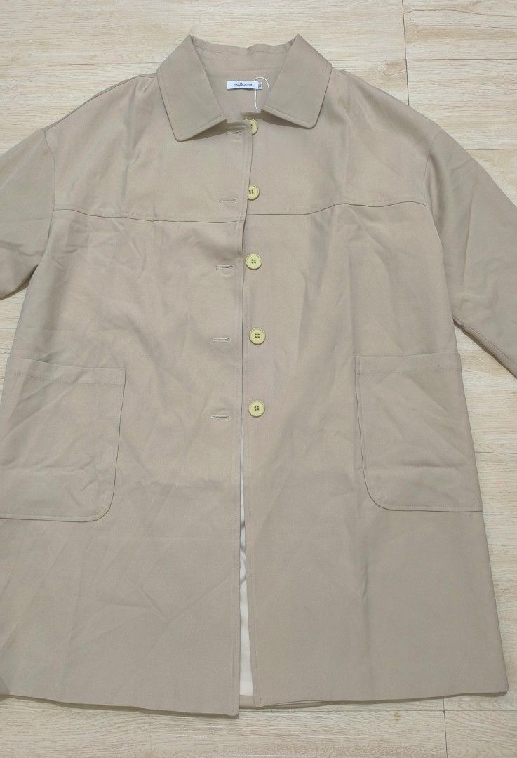 Long Beige Button Down Trench Coat (Category: Coats, Jackets and Outerwear) located in Dasmarinas. Submitted by modcloset_ph (Listing ID 1462312796, Image 3). Description: .