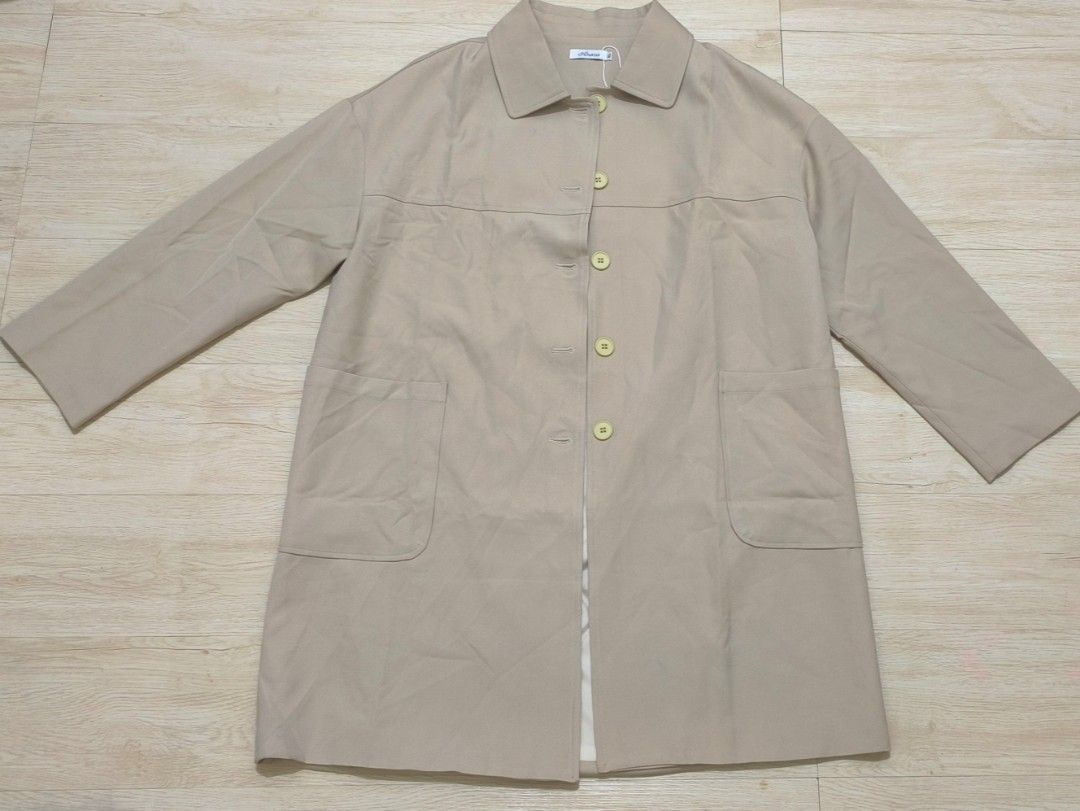 Long Beige Button Down Trench Coat (Category: Coats, Jackets and Outerwear) located in Dasmarinas. Submitted by modcloset_ph (Listing ID 1462312796, Image 1). Description: .