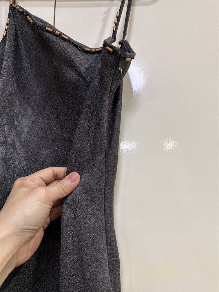Long dress spaghetti strap with asymmetrical top (Category: Evening dresses & gowns) located in Caloocan City. Submitted by redkooky (Listing ID 1462283821, Image 3). Description: Nice soft suede like fabric will not wrinkle Few beads missing Slit and zipper on one side Fits small going medium .