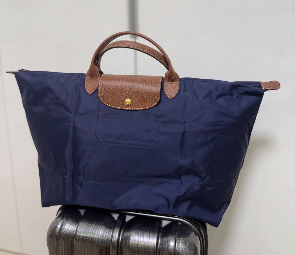 Longchamp Large Travel (Category: Tote Bags) located in Manila. Submitted by stopshop26 (Listing ID 1462343995, Image 1). Description: Longchamp Large Travel Brand new and original Onhand and ready to ship.