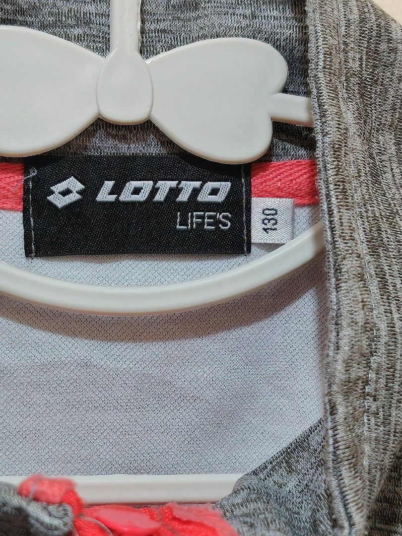 Lotto Life's Kids Track Jacket Size 130 (Category: Babies & Kids Fashion) located in Manila. Submitted by forthriftstorewarriors (Listing ID 1462319085, Image 2). Description: - Lotto Life's track jacket - Color: Grey and dark blue - Accents: Bright pink zipper and details - Sleeve detail: 'Lotto Sport' text - Size: 130 (7-8Y) - Ideal for active kids.