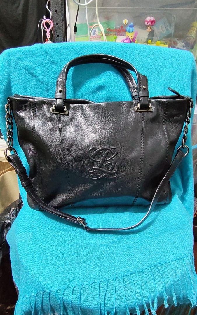 Louis Quatorze Black Tote Bag (Category: Tote Bags) located in Caloocan City. Submitted by jpmshoppe (Listing ID 1462318821, Image 1). Description: - Color: Black - Style: Tote Bag - Closure: Zipper - Interior: Patterned lining - Features: Spacious main compartment - Ideal for: Everyday use - Condition: Good, no major flaws.