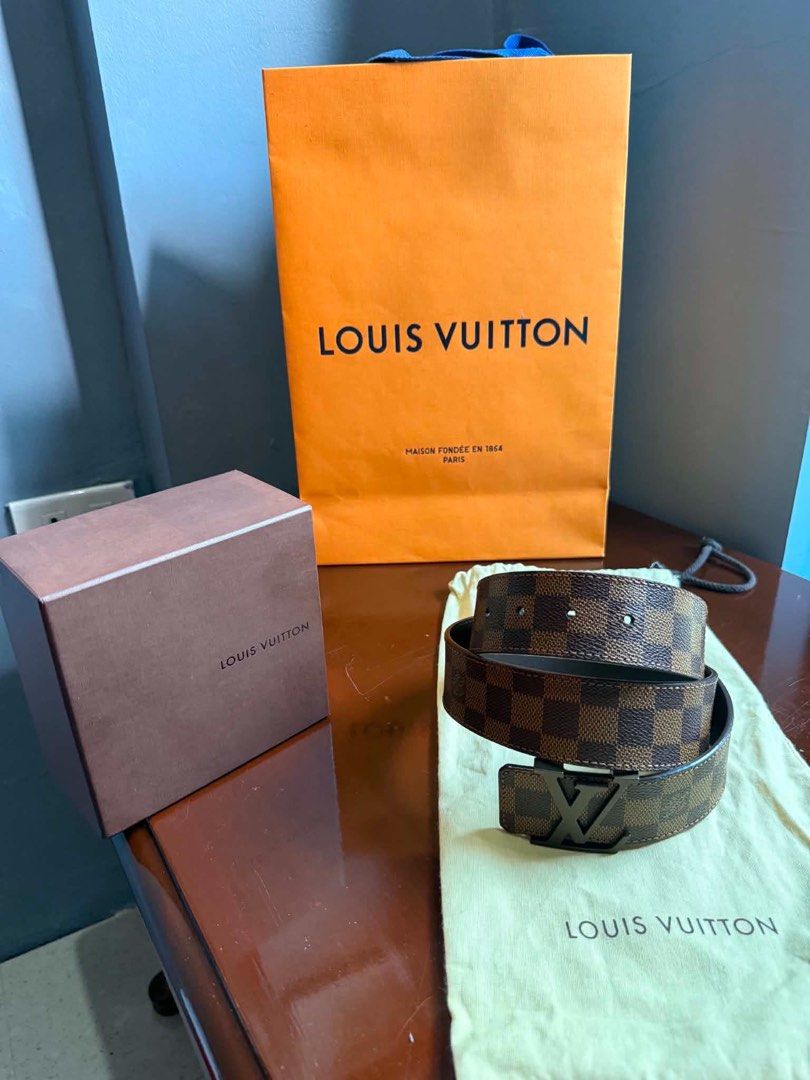 Louis Vuitton Damier Ebene Belt (Category: Luxury Accessories) located in Manila. Submitted by zhiacaballero (Listing ID 1462325625, Image 2). Description: FOR SALE: Louis Vuitton LV Initiales 40mm Reversible Belt •Size: 85/34 •Color/Design: Damier Ebene / Reversible •Condition: Good as new — only worn twice •No issues •Money Back if proven fake Loc: Cubao QC Available for meet-ups & shipping PM for photos and inquiries.