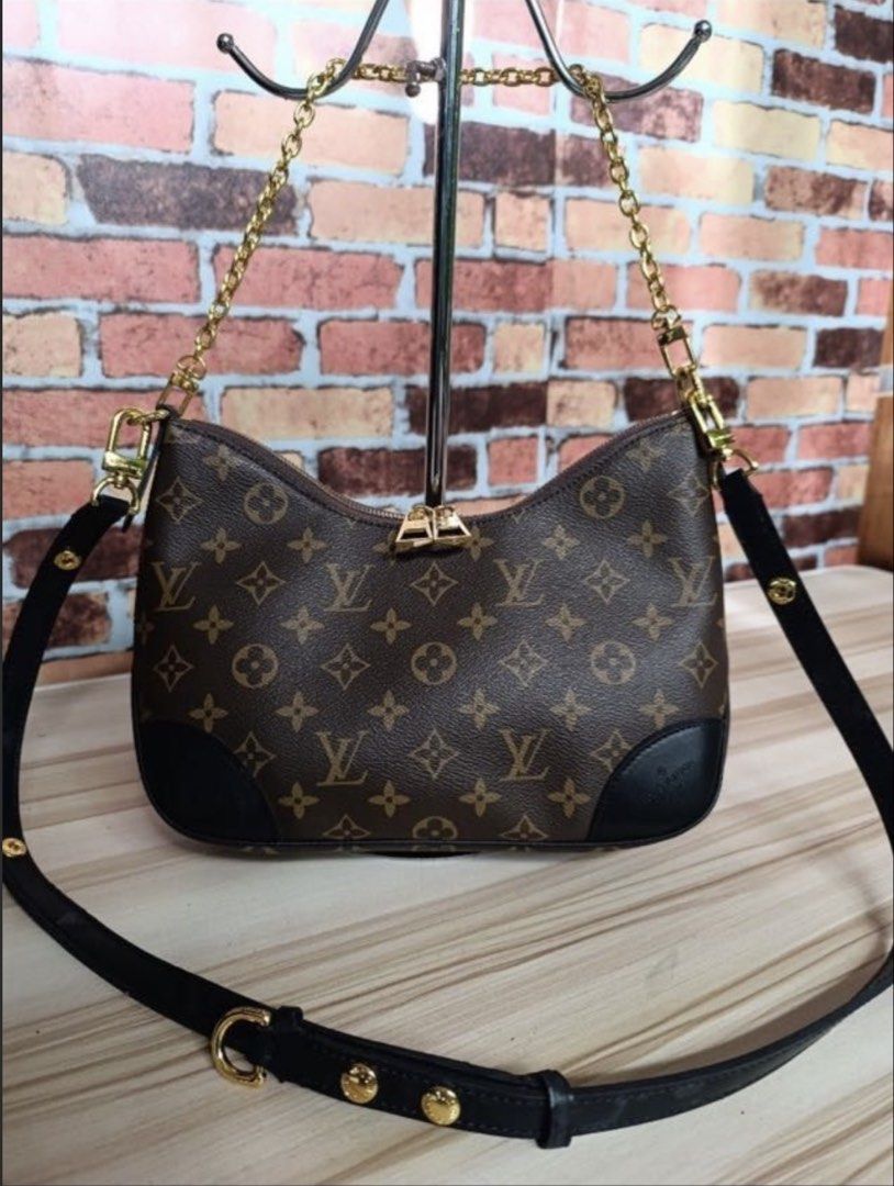 Louis Vuitton Monogram Canvas Shoulder Bag (Category: Luxury Bags & Wallets) located in Calasiao. Submitted by crzzrlc (Listing ID 1462336648, Image 1). Description: - Classic Louis Vuitton shoulder bag - Iconic monogram canvas with black leather trim - Includes gold chain strap and leather shoulder strap - Secure zipper closure - Versatile for everyday or special occasions.