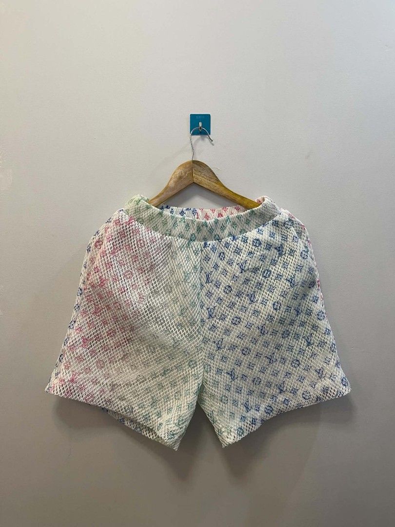Louis Vuitton Monogram Mesh Shorts (Category: Shorts) located in Manila. Submitted by gregorioju41138 (Listing ID 1462271761, Image 1). Description: - Authentic Louis Vuitton shorts - Iconic monogram pattern - Stylish mesh overlay - Eye-catching rainbow gradient on front panels - Comfortable elastic waistband - Size XL - Ideal for casual outings or lounging at home.