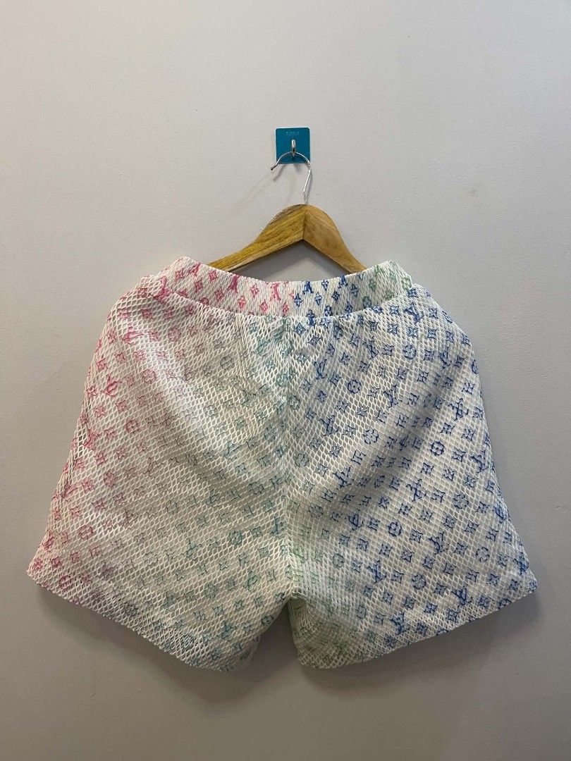 Louis Vuitton Monogram Mesh Shorts (Category: Shorts) located in Manila. Submitted by gregorioju41138 (Listing ID 1462271761, Image 3). Description: - Authentic Louis Vuitton shorts - Iconic monogram pattern - Stylish mesh overlay - Eye-catching rainbow gradient on front panels - Comfortable elastic waistband - Size XL - Ideal for casual outings or lounging at home.