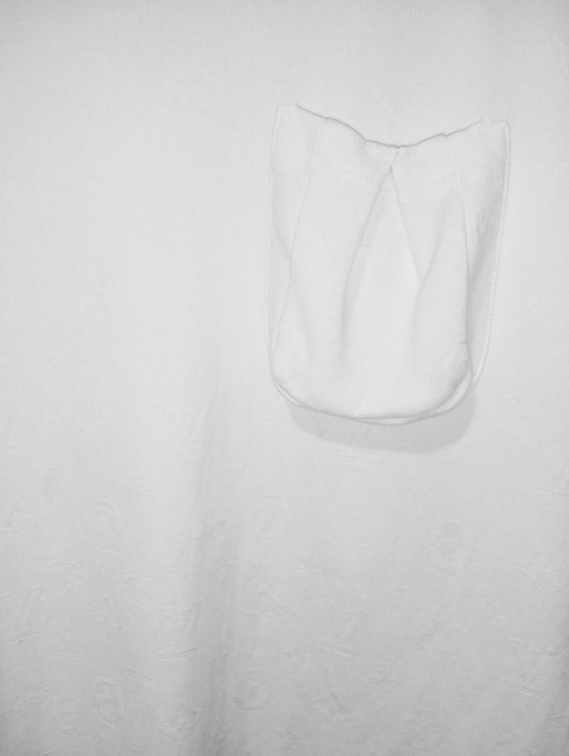 Louis Vuitton Monogram T-shirt White (Category: Tshirts & Polo Shirts ) located in Caloocan City. Submitted by yazzielux (Listing ID 1462431768, Image 3). Description: - Authentic Louis Vuitton t-shirt - Classic white color - All-over LV monogram pattern - Features a chest pocket - Crew neck, short sleeves - Versatile staple piece for any wardrobe - Pairs well with jeans or shorts.