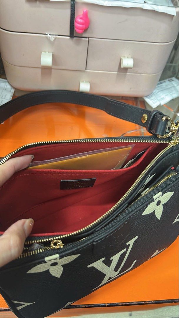 Louis Vuitton Pouch Bag Black Monogram (Category: Voice Recorders) located in Angeles City. Submitted by migs_font29 (Listing ID 1462350831, Image 3). Description: - Authentic Louis Vuitton Monogram Pouch Bag - Classic LV monogram print - Vibrant red interior lining - Secure zipper closure - Comes with detachable chain strap - Includes detachable leather strap - Authenticity code visible inside - Versatile: great for everyday use or as a clutch.