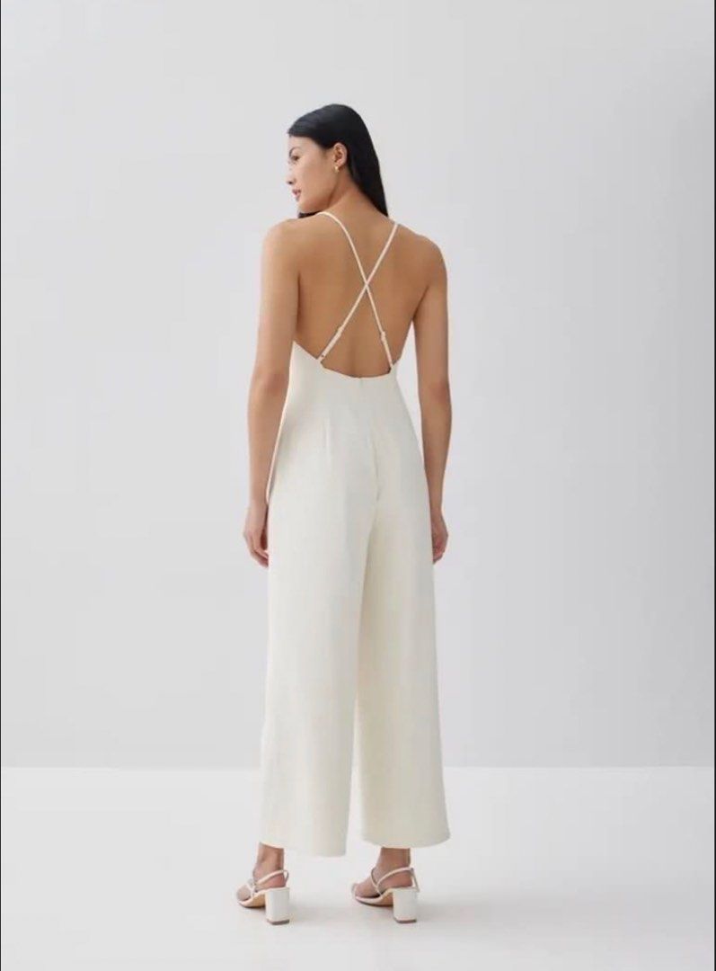 Love bonito padded jumpsuit (Category: Jumpsuits) located in Cavite. Submitted by graceyhanna (Listing ID 1462290811, Image 2). Description: - Elegant cream white jumpsuit - Flattering wide-leg pants - Delicate spaghetti straps in front - Stylish criss-cross detail on the back - Flirty V-neckline - Ideal for special events or a sophisticated night out - Effortlessly chic and versatile.