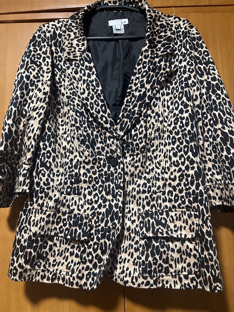 Luii Leopard Print Blazer Jacket Size L (Category: Coats, Jackets and Outerwear) located in Pasig City. Submitted by zebteashoppe01 (Listing ID 1462375376, Image 2). Description: - Luii Leopard Print Blazer - Size: L - Sleeve Style: Three-quarter sleeves with button detail - Pockets: Two front pockets - Lining: Black interior lining - Style: Bold statement piece, perfect for dressing outfits up or down. For jeans and for casual or formal wear 090