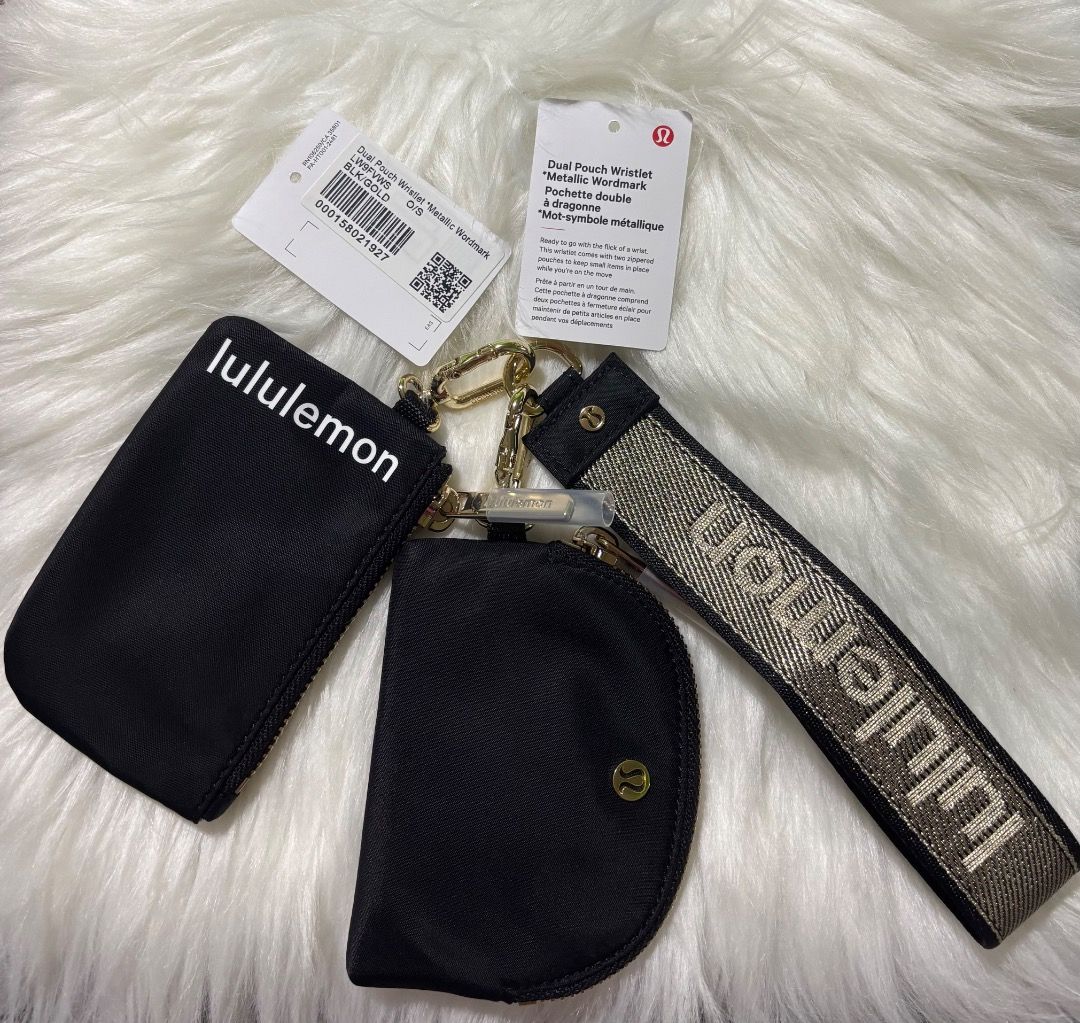 Lululemon Black Pouch Set with Gold Logo Keychain (Category: Other Accessories) located in Davao. Submitted by airadspbls (Listing ID 1462372032, Image 1). Description: - Authentic Lululemon pouch set - Includes a black pouch with white 'lululemon' lettering - Comes with a smaller black pouch featuring a gold Lululemon logo - Attached gold and black woven keychain strap with gold 'lululemon' text - Ideal for organizing small essentials like cards
