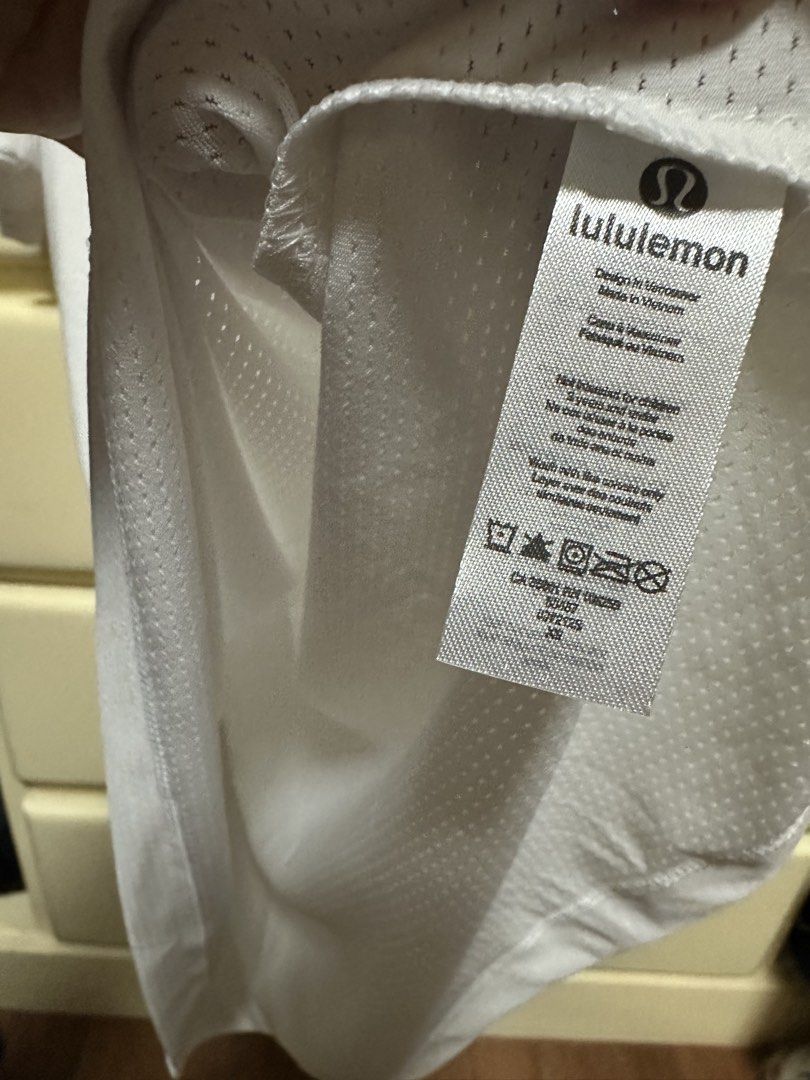 Lululemon Dri-Fit shirt (White) (Category: Activewear) located in Marikina City. Submitted by tziescloset (Listing ID 1462317315, Image 3). Description: 📌Brand new 📌 runs small - fits Large to XXL 📌 W - 19.5” pit to pit.