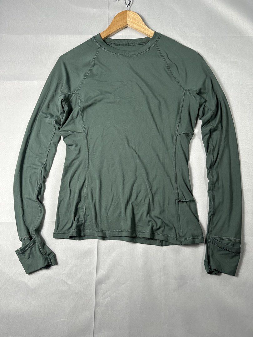Lululemon Work out Long Sleeve Shirt (Category: Activewear) located in Cabanglasan. Submitted by thefashiongarage.co (Listing ID 1462438981, Image 1). Description: Brand - Lululemon Model/Name - Its Rulu Long Sleeve Shirt Size on Tag - Medium Conditiion - Excellent Condition Dimension (WxLxH) - Category- Yoga/Casual Fitting - Slim Fit/Fitted Made in - Material - Stretchable Color - Army Green/Navy Green Design - Plain Year - Inclusion - None Note