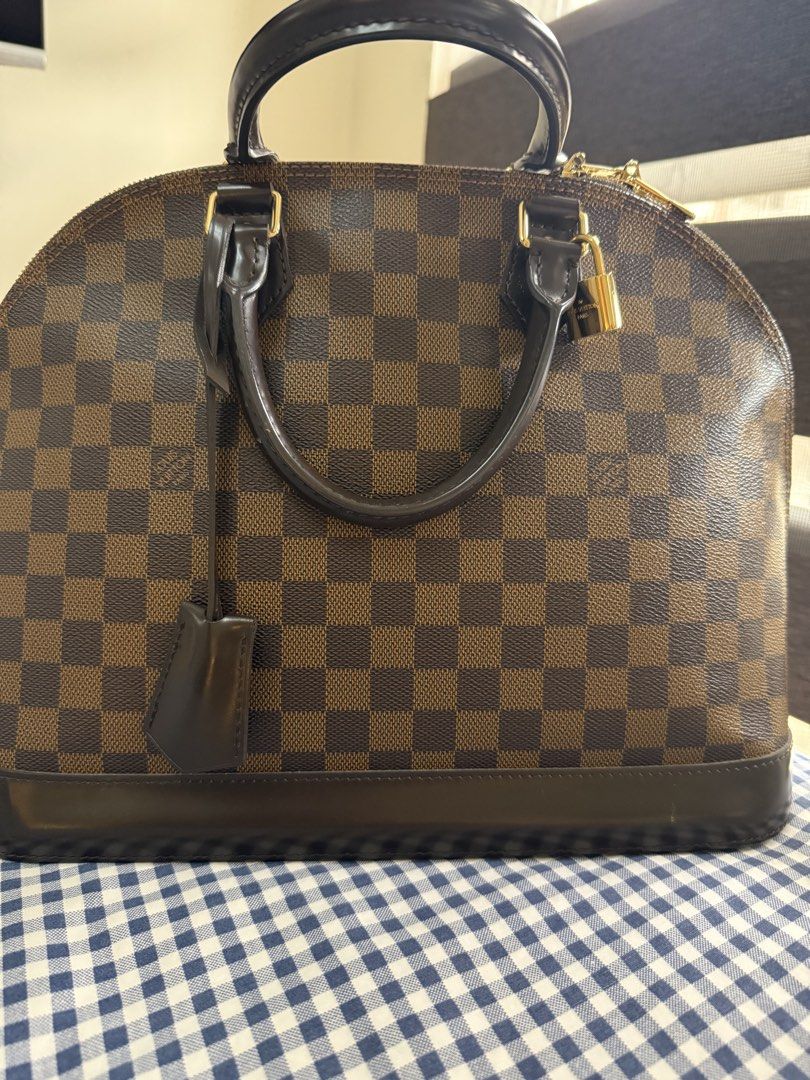 Lv alma mm (damier ebene) (Category: Luxury Bags & Wallets) located in Manila. Submitted by ajaypiagv (Listing ID 1462337069, Image 1). Description: Authentic it money back triple times guaranteed! Store bought! With receipt Lowballers will bot entertained Rfs: funding new bag .