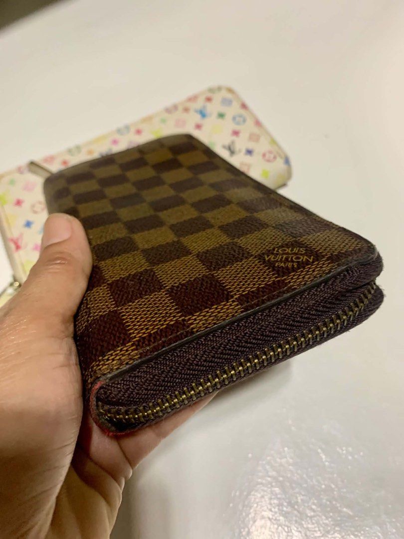 LV Long Wallet - BUNDLE (Category: Wallets & Card holders) located in Davao. Submitted by luxxe_closet (Listing ID 1462356807, Image 2). Description: Preloved LV long zipper wallet bundle. Coded. In very good conditions. No flaws. No issues. No crackings.