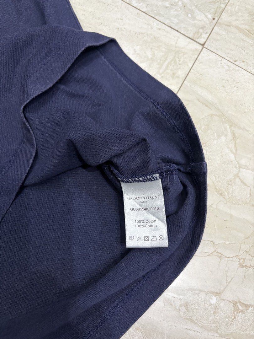 Maison Kitsune Chillax Fox Patch Regular Tee-Shirt (Category: Tshirts & Polo Shirts ) located in General Santos City (Dadiangas). Submitted by a.rt.eyes (Listing ID 1462417815, Image 3). Description: Actual size medium for adult Dimension width 20 length 28 Excellent condition Color rate 9/10, color may vary due to lighting camera focus or zoom. The color may look slightly different when the photo is taken up close. Original Location general sant