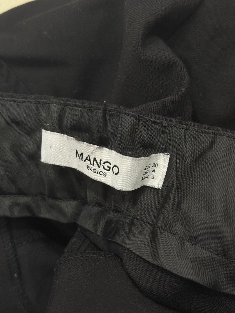 Mango Basics Black High-Waisted Trousers (Category: Other Bottoms) located in Quezon City. Submitted by wtvrjules (Listing ID 1462411345, Image 3). Description: - Mango Basics trousers - High-waisted fit - Straight leg cut *Slight flaw: one of the legs has a dropped hem.