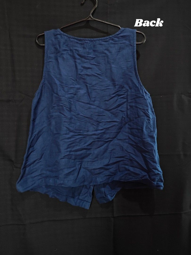 Mango Blue Sleeveless Vest (Category: Blouses) located in Manila. Submitted by janes__closet (Listing ID 1462355855, Image 2). Description: Brand: Mango Size: X-Small to Small Color: Blue.