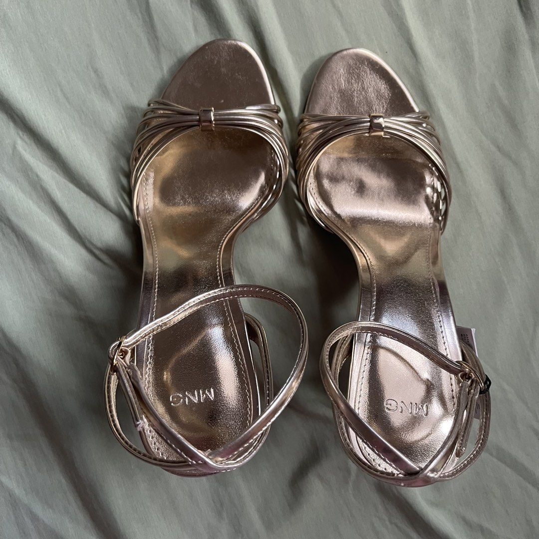 mango gold heeled sandals with straps (Category: Flats & Sandals) located in Imus. Submitted by an4kin (Listing ID 1462304603, Image 2). Description: 🗒️ condition: brand new, just tried on once. 🗒️ packaging: comes with a replacement box (threw the original away but i have a pic of it) 🗒️ srp: ₱2,300+ 🥢 rfs: the heel is just a bit too high for my personal comfort level. .