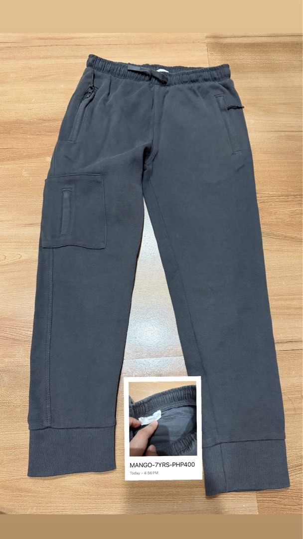 Mango Kids Cargo Pants - Beige & Grey (Category: Babies & Kids Fashion) located in San Pedro. Submitted by tineodulio (Listing ID 1462347401, Image 2). Description: - Two pairs of Mango Kids Cargo Pants - Available in Beige and Dark Grey - Size: 7 Years - Features elastic waistband with drawstring - Ribbed cuffs for a snug fit - Convenient cargo pockets on the sides - Ideal for everyday wear and active play.