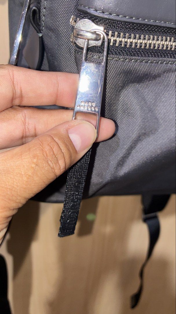 Marc Jacobs Black Nylon Backpack (Category: Backpacks) located in Placer. Submitted by talaalond61563 (Listing ID 1462277169, Image 3). Description: - Classic gray Marc Jacobs backpack - Durable nylon material - Front zip pocket and main compartment - Silver-tone hardware with subtle branding - Adjustable shoulder straps for comfort - Ideal for everyday use or travel.