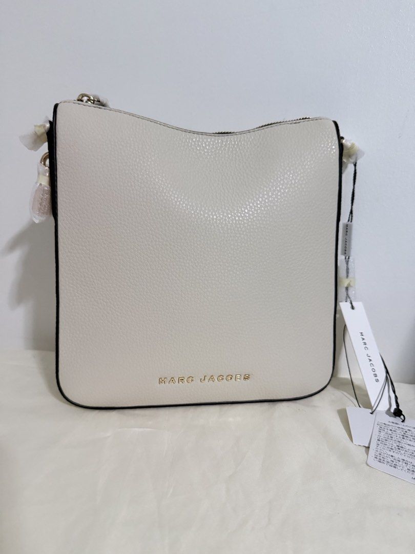 Marc Jacobs Drifter Crossbody Bag (Category: Luxury Bags & Wallets) located in Pasig City. Submitted by toryluxebags (Listing ID 1462427942, Image 3). Description: ₱10,499 BRANDNEW Marc Jacobs Drifter Crossbody Bag Comes with Paperbag 100% Authentic Money Back Guarantee Payment Today, Ships Today ✨ DM for detailed photos & inquiries!💜.